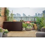 Kerti tárolóláda, Keter Emily, barna, 117,8 × 44,5 × 58 cm, 277 l, időjárásálló, lakatolható, kerekes, fogantyúkkal, rattan hatású, ülőhelyként is használható